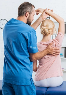 a2z chiropractic physiotherapist stretching patients arm on massage